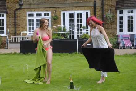 Victoria Summers and Roxi Keogh in the garden, putting a picnic blanket down. Victoria Summers and Roxi Keogh in the garden, putting a picnic blanket down.
